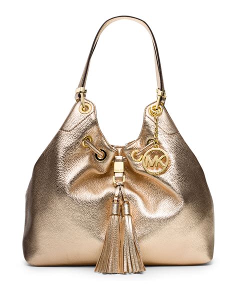 michael kors pale gold handbag|michael kors large gold tote.